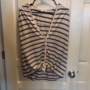 Short sleeve button up top. Navy and white stripes